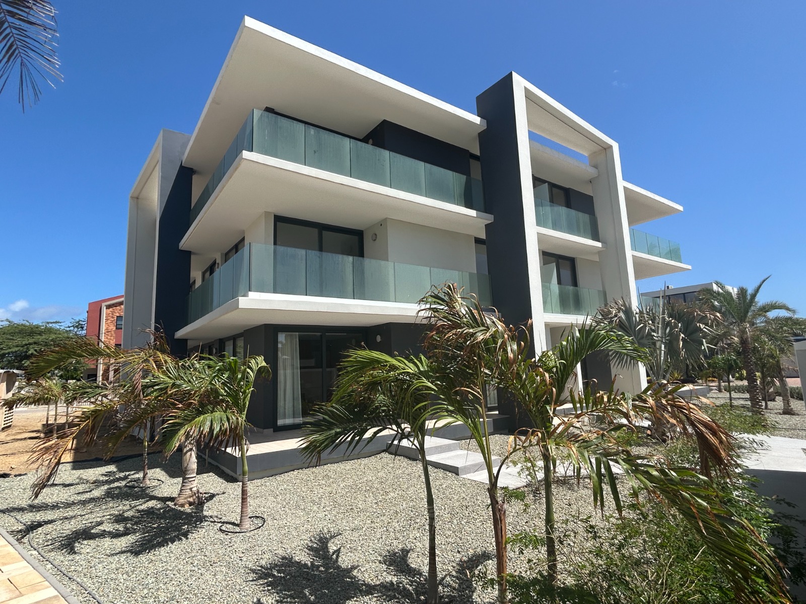 Side view of the condominium with glass balconies